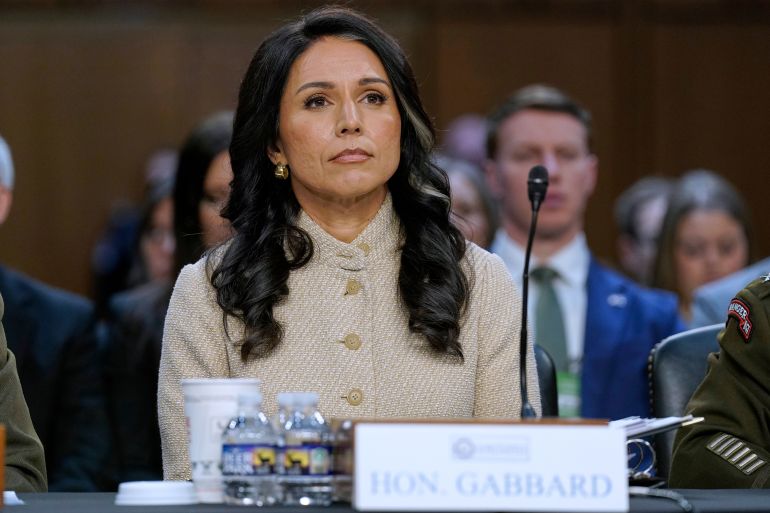 FILE - Director of National Intelligence Tulsi Gabbard listens during the Senate Committee on Intelligence hearings on Capitol Hill, March 18, 2026, in Washington. (AP Photo/Jose Luis Magana, File)