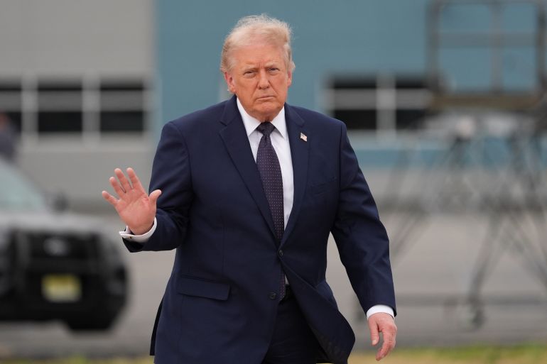 President Donald Trump walks from Marine One to board Air Force One at Morristown Airport, Friday, May 22, 2026, in Morristown, N.J. (AP Photo/Alex Brandon)