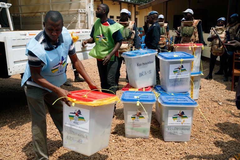 Election officials bring ballot boxes to the central election commission warehouse to be processed in Bangui, Central African Republic, Monday Feb. 15, 2016. Two former prime ministers, Faustin Archange Touadera and Anicet Georges Dologuele, ran in the second round of presidential elections Sunday to end years of violence pitting Muslims against Christians in the Central African Republic. Central Africans will also vote in Legislative elections. (AP Photo/Jerome Delay)