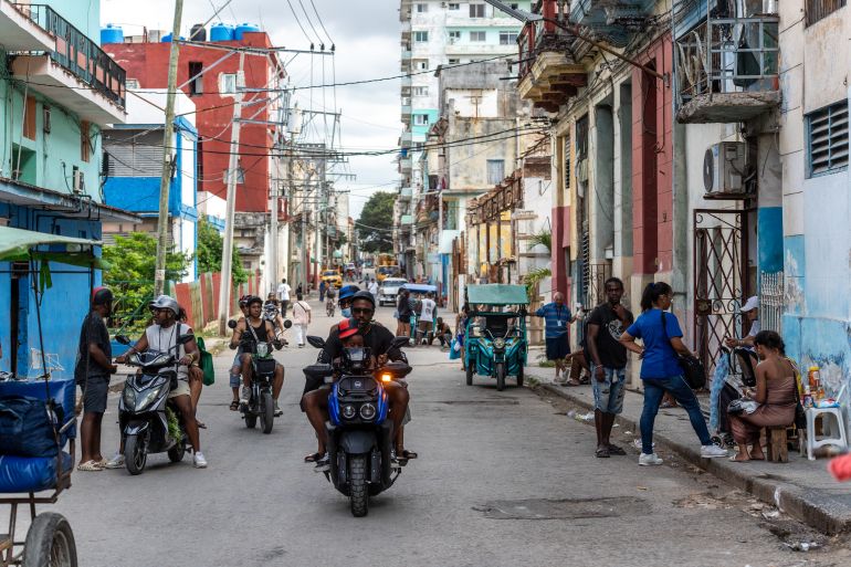HAVANA, CUBA - MAY 14: Cubans use solar panels, electric vehicles and portable battery systems as alternative energy sources amid ongoing fuel shortages and blackouts in Havana, Cuba, on May 14, 2026. Cuban authorities said Russian oil supplies had run out and fuel reserves were nearly depleted, worsening electricity shortages across the country. (Photo by Magdalena Chodownik/Anadolu via Getty Images)