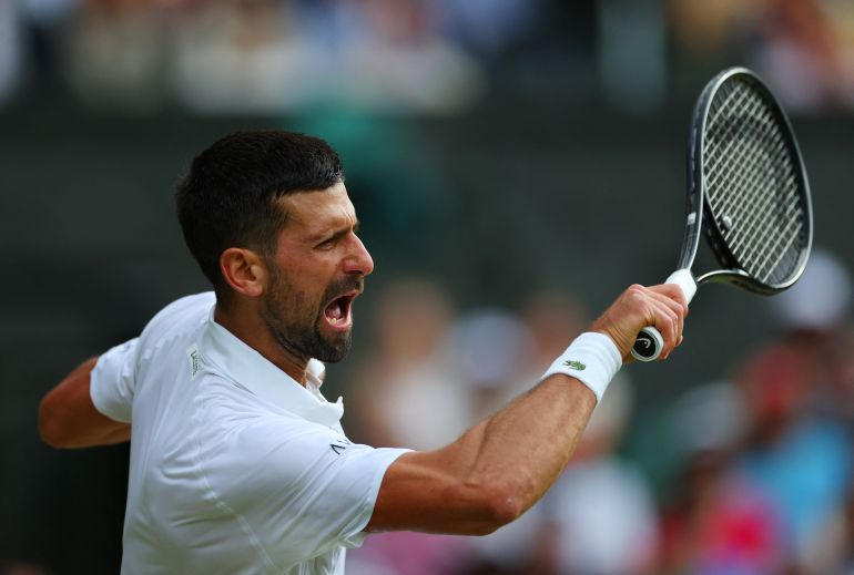 Tennis - Wimbledon - All England Lawn Tennis and Croquet Club, London, Britain - July 9, 2025 Serbia's Novak Djokovic in action during his quarter final match against Italy's Flavio Cobolli REUTERS/Isabel Infantes