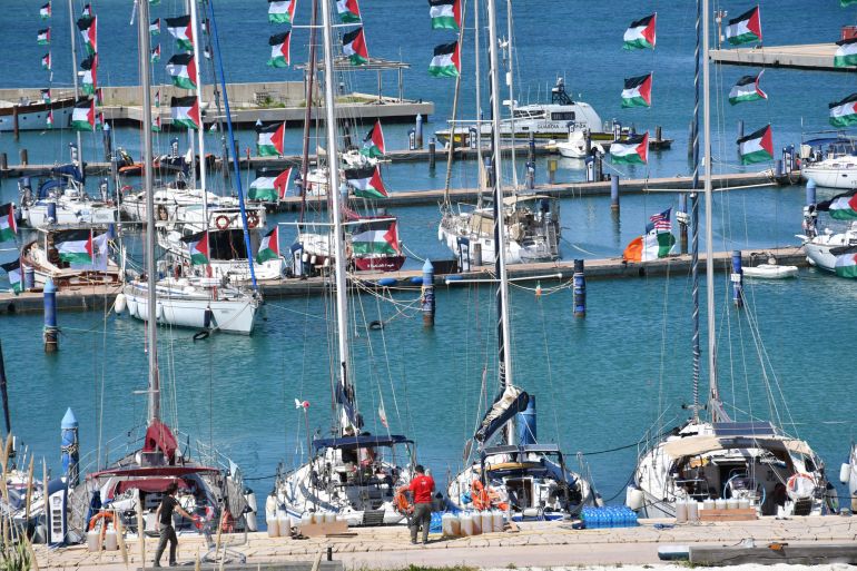 epaselect epa12905039 Vessels participating in the Global Sumud Flotilla (GSF) are moored at the Port of Xiphonia in Augusta, near Syracuse, Sicily island, southern Italy, 21 April 2026. The ships are scheduled to depart for the Gaza Strip on 24 April as part of the 'Spring 2026 Mission,' a coordinated international effort to challenge the maritime blockade and deliver essential medical supplies to Palestinian civilians. EPA/ORIETTA SCARDINO