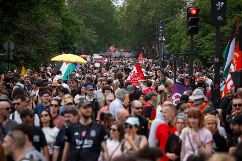 epa12927030 Thousands of protesters take part in the annual May Day demonstration in Paris, France, 01 May 2026. Labor Day, also known as International Workers' Day or May Day, is observed annually on 01 May worldwide to celebrate the economic and social achievements of workers and fight for laborers' rights. EPA/YOAN VALAT