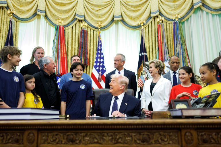 epa12934628 US President Donald Trump speaks before signing a proclamation inside the Oval Office at the White House in Washington, DC, USA, 05 May 2026. The memorandum is set to restore the Presidential Fitness Test Award, a competitive school-based fitness program last seen under the Obama administration. EPA/TOM BRENNER / POOL