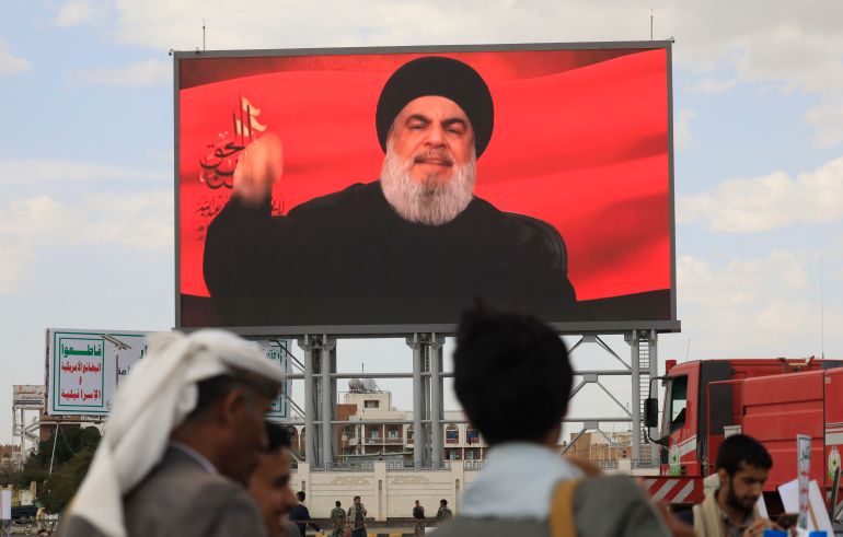epa12897059 Houthi supporters gather in front of a digital billboard featuring late Hezbollah leader Hassan Nasrallah during a solidarity rally with Hezbollah following a Lebanon-Israel ceasefire, in Sana'a, Yemen, 17 April 2026. Thousands of Houthi supporters rallied in Sana'a to voice solidarity with Hezbollah and the people of Lebanon, a day after Lebanon and Israel agreed to a 10-day ceasefire. EPA/YAHYA ARHAB