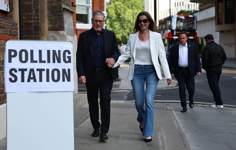 epa12937934 Britain's Prime Minister Keir Starmer (L) and his wife Victoria (R) arrive at a polling station in London, Britain, 07 May 2026. Local elections take place across the United Kingdom on 07 May 2026. EPA/NEIL HALL
