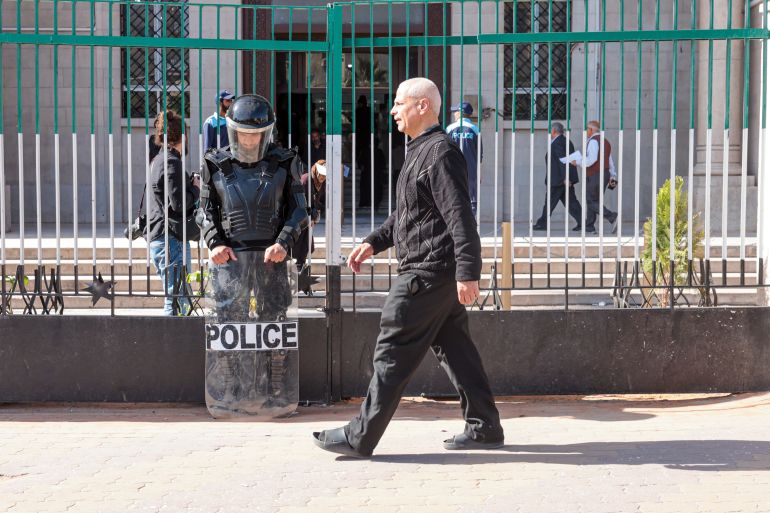 epa12914706 A man walks in front of a court where hearings in the trial against former Syrian regime official Brigadier General Atef Najib will begin, Damascus, Syria, 26 April 2026. Najib, a cousin of ousted former Syrian president Bashar al-Assad, previously headed the Political Security Directorate of the former Syrian regime in the southern region of Daraa and is accused of orchestrating a violent crackdown against protesters early in the Syrian conflict. EPA/MOHAMMED AL RIFAI