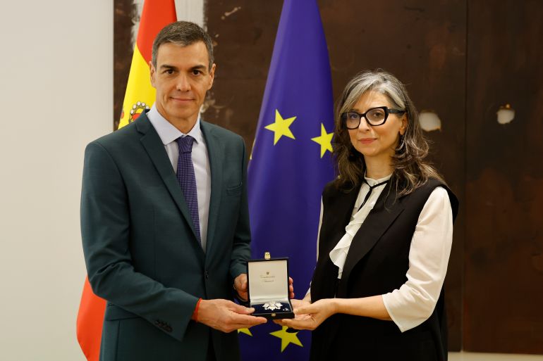 epaselect epa12938388 Spanish Prime Minister Pedro Sanchez (L) decorates United Nations Special Rapporteur on the Occupied Palestinian Territories Francesca Albanese (R) at Moncloa Palace, in Madrid, Spain, 07 May 2026. EPA/MARISCAL