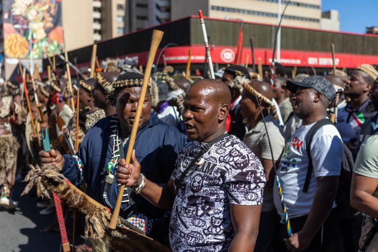 epa12936592 Members of civil society organizations march in Durban, South Africa, 06 May 2026, demanding stricter enforcement of immigration regulations concerning undocumented immigrants and foreign nationals. EPA/STRINGER