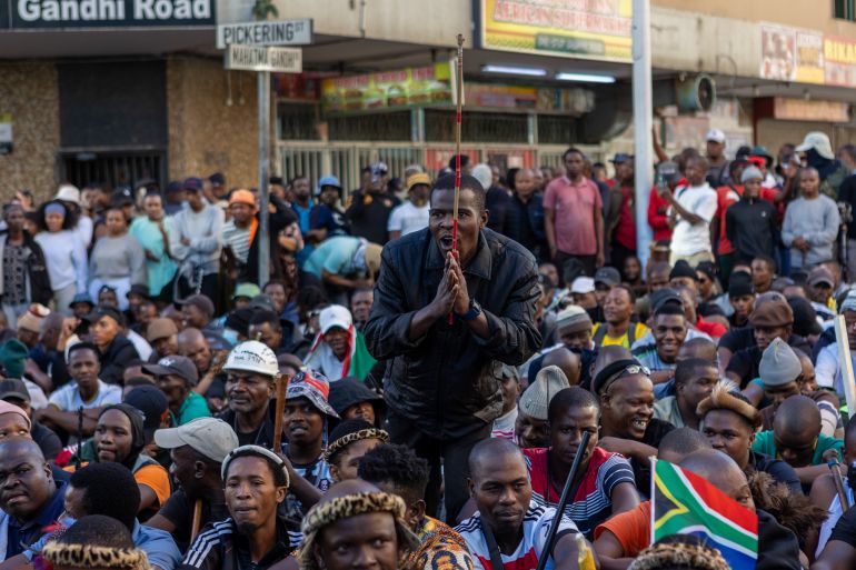 epa12936598 Members of civil society organizations march in Durban, South Africa, 06 May 2026, demanding stricter enforcement of immigration regulations concerning undocumented immigrants and foreign nationals. EPA/STRINGER