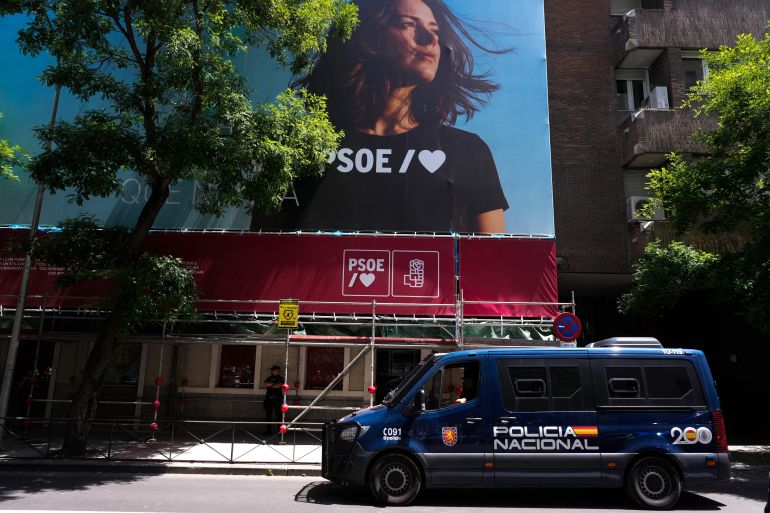 epa12997672 A National Police van is parked outside the ruling Socialist Party (PSOE) headquarters, in Madrid, Spain, 27 May 2026. Agents of the Civil Guard's Central Operative Unit (UCO) elite criminal investigation division raided the PSOE headquarters as part of an investigation into alleged illegal party financing. EPA/Borja Sanchez-Trillo