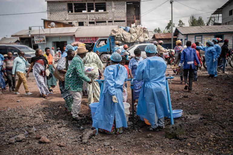 epaselect epa12997437 Health workers in protective gowns and masks operate at a checkpoint set up for preventive measures against Ebola in Kanyaruchinya, near Goma, North Kivu, Democratic Republic of Congo, 27 May 2026. The World Health Organization (WHO) has declared the Ebola outbreak, caused by the Bundibugyo virus, in the Democratic Republic of the Congo a public health emergency of international concern. EPA/MARIE JEANNE MUNYERENKANA