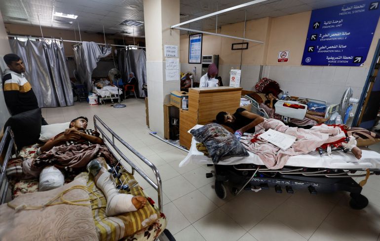 gaza4-1775469565 Wounded Palestinians, who were evacuated from the European Hospital after the Israel army ordered Palestinians to evacuate the eastern part of Khan Younis, lie down at Nasser Hospital, amid the Israel-Hamas conflict, in Khan Younis in the southern Gaza Strip July 2, 2024. REUTERS/Mohammed Salem