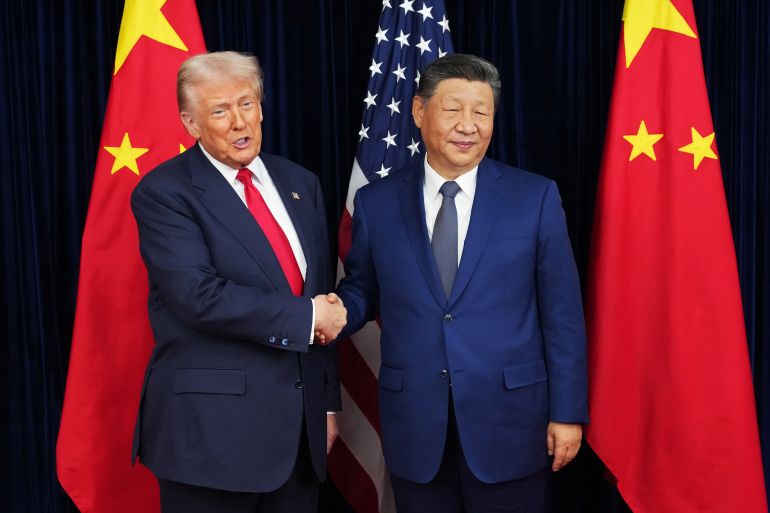 BUSAN, SOUTH KOREA - OCTOBER 30: U.S. President Donald Trump greets Chinese President Xi Jinping ahead of a bilateral meeting at Gimhae Air Base on October 30, 2025 in Busan, South Korea. Trump is meeting Xi for the first time since taking office for his second term, following months of growing tension between both countries. (Photo by Andrew Harnik/Getty Images)