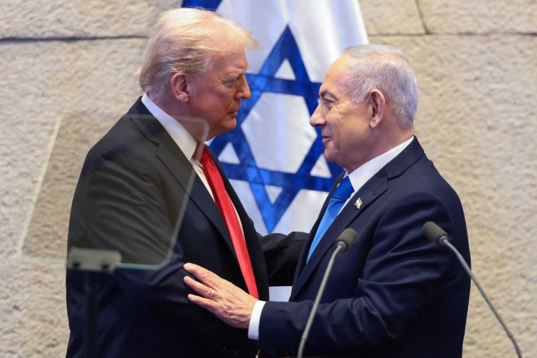 getty_69ccf99d62-1775040925 JERUSALEM - OCTOBER 13: U.S. President Donald Trump speaks with Israeli Prime Minister Benjamin Netanyahu at the Knesset, Israel's parliament, on October 13, 2025 in Jerusalem. President Trump is visiting the country hours after Hamas released the remaining Israeli hostages captured on Oct. 7, 2023, part of a US-brokered ceasefire deal to end the war in Gaza. (Photo by Evelyn Hockstein - Pool/Getty Images)