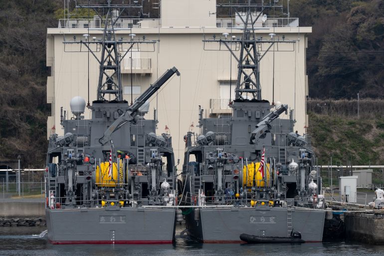 YOKOSUKA, JAPAN - MARCH 30: Japan Maritime Self-Defense Force's JS Awaji and JS Hirado minesweepers are moored at Yokosuka Naval Base on March 30, 2026 in Yokosuka, Japan. (Photo by Tomohiro Ohsumi/Getty Images)