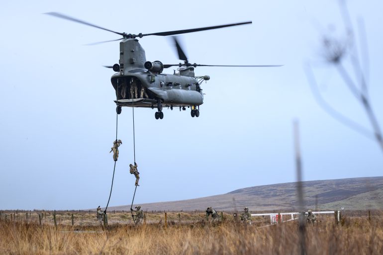 OTTERBURN, UNITED KINGDOM - JANUARY 31: Members of the Special Operations Forces fast rope from a Mk.6 CH47 Chinook helicopter during a validation exercise on January 31, 2026 in Otterburn, United Kingdom. The training exercise involves members of the UK Special Operations Forces from the British Army, Royal Air Force and Royal Marines, and is designed to demonstrate operational readiness of the joint rapid-reaction forces. The successful completion of Exercise Hyperion Storm validates the UK's integration with the NATO Allied Reaction Force (ARF), part of the multinational military alliance ready to deploy in response to global security concerns. (Photo by Leon Neal/Getty Images)