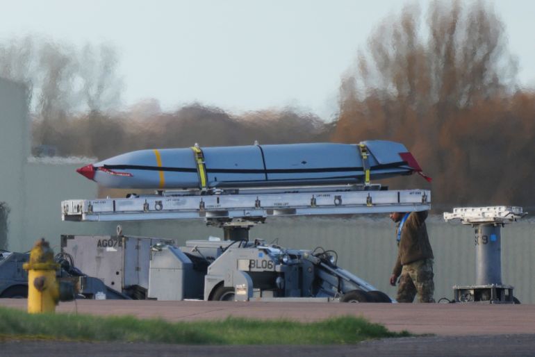 FAIRFORD, ENGLAND - MARCH 13: Munitions are handled by U.S. ground crew at RAF Fairford on March 13, 2026 in Fairford, England. Prime Minister Keir Starmer is allowing the US to use British bases, including RAF Fairford and Diego Garcia, to launch "defensive" strikes against Iranian missile sites while stating the UK would not join "offensive" combat. (Photo by Christopher Furlong/Getty Images)