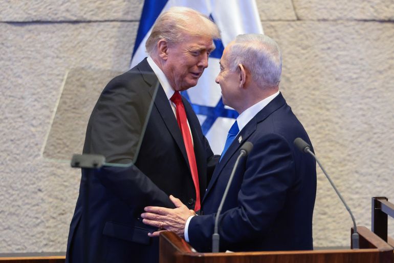 getty_69fb516c63-1778078060-1 JERUSALEM - OCTOBER 13: U.S. President Donald Trump shakes hands and speaks with Israeli Prime Minister Benjamin Netanyahu at the Knesset, Israel's parliament, on the day of Trump's address on October 13, 2025 in Jerusalem. President Trump is visiting the country hours after Hamas released the remaining Israeli hostages captured on Oct. 7, 2023, part of a US-brokered ceasefire deal to end the war in Gaza. (Photo by Evelyn Hockstein - Pool/Getty Images)