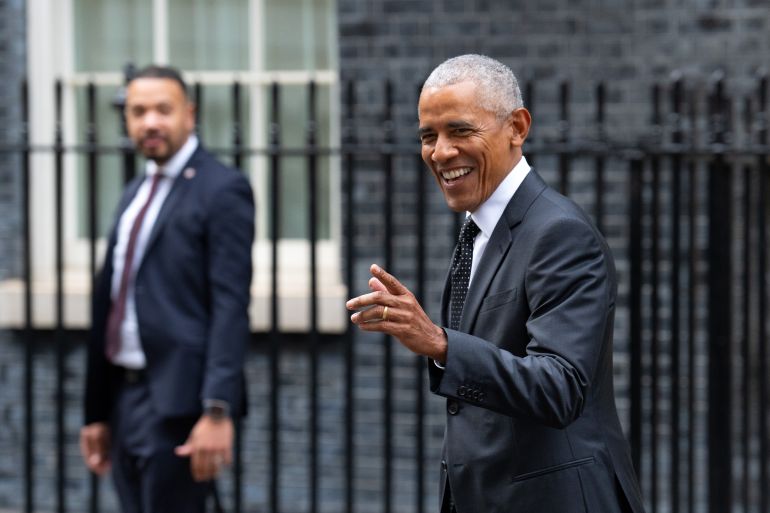 LONDON, ENGLAND - MARCH 18: Former United States President Barack Obama gestures to a journalist as he leaves 10 Downing Street after meeting UK Prime Minister, Rishi Sunak, on March 18, 2024 in London, England. President Obama has been in Europe this week and appeared at a moderated debate "An Evening with President Barack Obama" last night in Antwerp. The evening focussed on his vision of the future and the challenges the world is facing. (Photo by Carl Court/Getty Images)