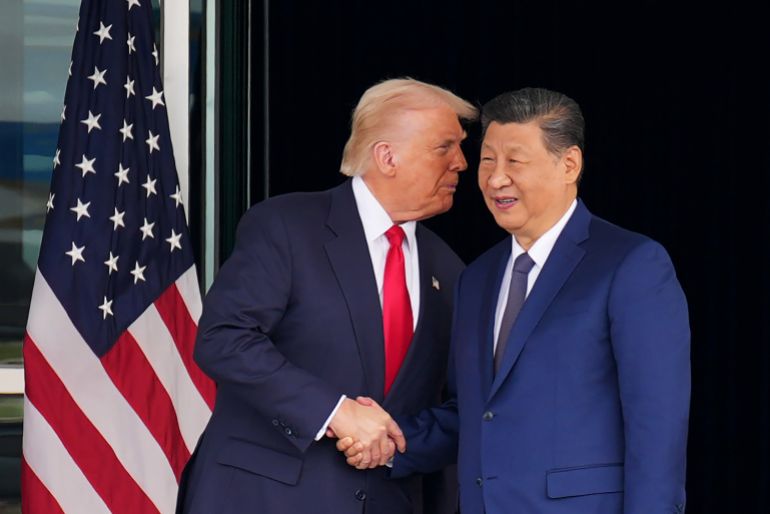 BUSAN, SOUTH KOREA - OCTOBER 30: U.S. President Donald Trump and Chinese President Xi Jinping shake hands as they depart following a bilateral meeting at Gimhae Air Base on October 30, 2025 in Busan, South Korea. Trump is meeting Xi for the first time since taking office for his second term, following months of growing tension between both countries. (Photo by Andrew Harnik/Getty Images)