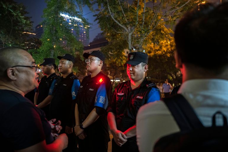 BEIJING, CHINA - MAY 13: Guards prepare for the arrival of U.S. President Donald Trump on May 13, 2026 in Beijing, China. President Donald Trump arrived in Beijing on May 13th for a two day summit with Chinese President Xi Jinping. It is the first visit to China by a U.S. President since Trump's last visit in 2017. (Photo by Kevin Frayer/Getty Images)