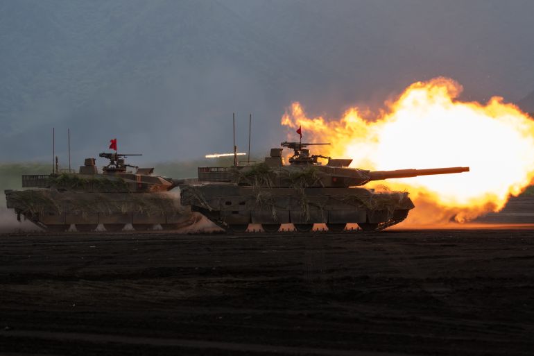 getty_6a11938027-1779536768 GOTEMBA, JAPAN - JUNE 8: A Japan Ground Self-Defense Force (JGSDF) battle tank fires ammunition during a live-fire exercise at the East Fuji Maneuver Area on June 08, 2025, in Gotemba, Shizuoka Prefecture, Japan. The annual drill took place after Japanese Prime Minister Shigeru Ishiba stated in March that Japan should increase its defense spending to at least 3% of GDP as soon as possible, in response to pressure from the United States. (Photo by Tomohiro Ohsumi/Getty Images)