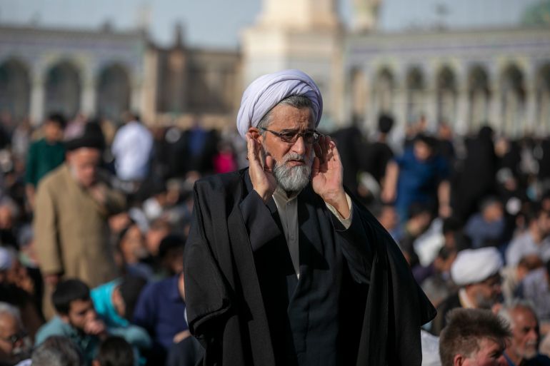 QOM, IRAN - MAY 26: A man attends a religious ceremony during Eid al-Adha on May 26, 2026 in Qom, Iran. Eid al-Adha (the Festival of Sacrifice) is one of the most sacred holidays in Islam, expected to be celebrated from 26–27 May 2026 until 29–30 May 2026 depending on regional moon sightings. It honors the willing of Prophet Ibrahim to sacrifice his son, Ismail, in obedience to God's command and marks the conclusion of the annual Hajj pilgrimage to Mecca. (Photo by Majid Saeedi/Getty Images)