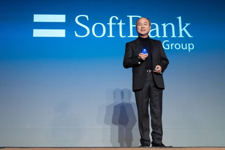 TOKYO, JAPAN - FEBRUARY 3: SoftBank Group CEO Masayoshi Son holds a crystal ball as he delivers a speech during an event titled "Transforming Business through AI" in Tokyo, Japan, on February 03, 2025. SoftBank and OpenAI announced that they have agreed a partnership to set up a joint venture for artificial intelligence services in Japan today. (Photo by Tomohiro Ohsumi/Getty Images)