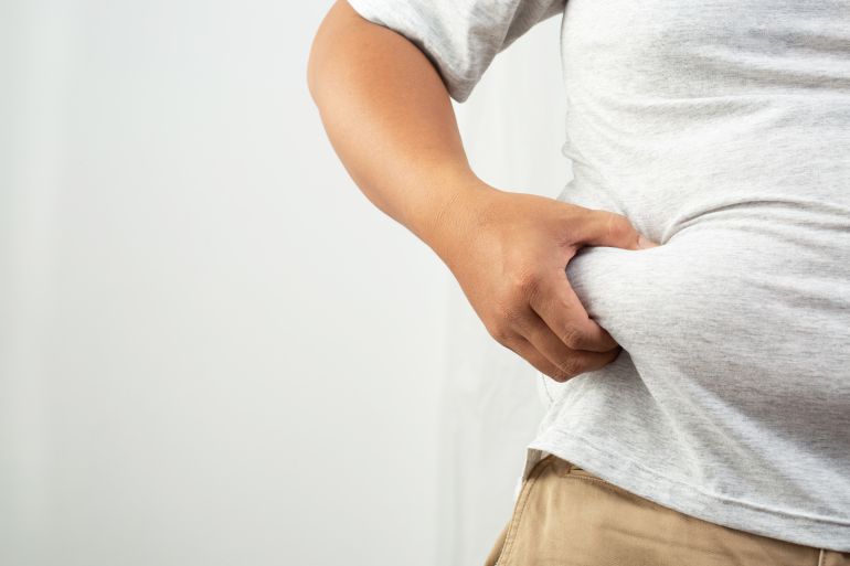 Obesity is the cause of diabetes and high blood pressure. كبير البطن - السمنة. المصدر: غيتي