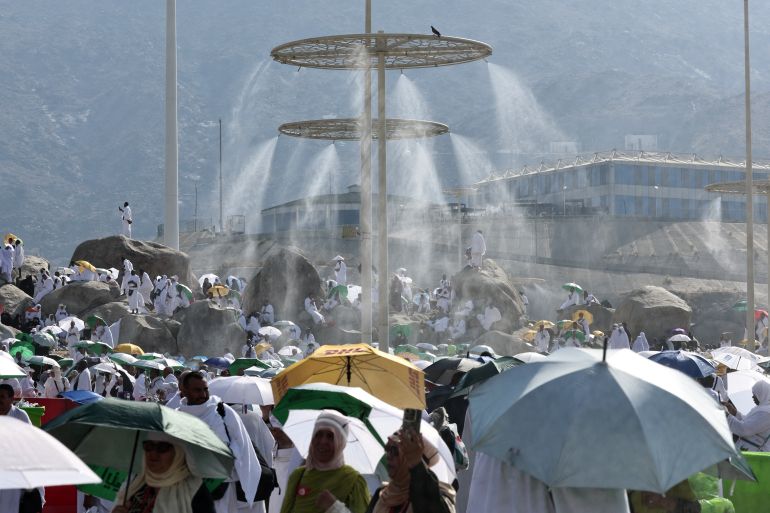 hajj4-1779272427 Mist dispensers refreshen Muslim pilgrims at the base of Saudi Arabia's Mount Arafat, also known as Jabal al-Rahma or Mount of Mercy, during the climax of the Hajj pilgrimage on June 15, 2024. More than 1.5 million Muslims will pray on Mount Arafat in soaring temperatures on June 15, in the high-point and most gruelling day of the annual Hajj pilgrimage, one of the five pillars of Islam that must be performed at least once by all Muslims who have the means to do so. (Photo by FADEL SENNA / AFP)
