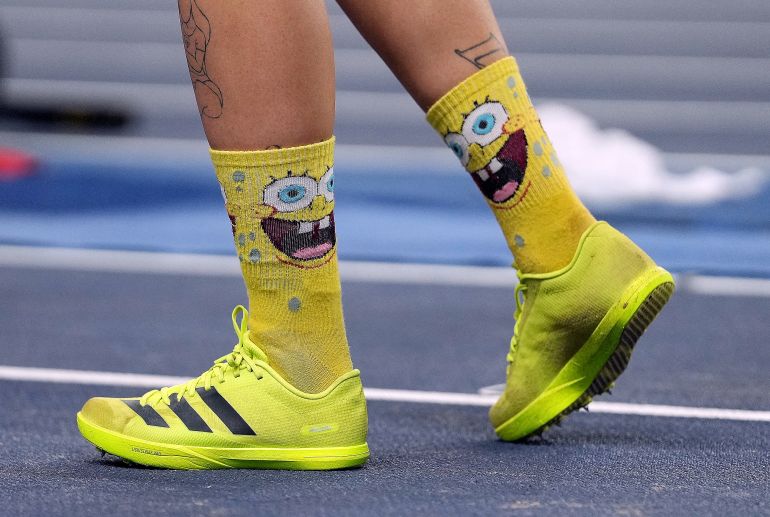 Athletics - World Indoor Championships - Kujawsko-Pomorska Arena, Torun, Poland - March 22, 2026 The socks of Greece's Anastasia Ntragkomirova are pictured during the women's pentathlon long jump REUTERS/Aleksandra Szmigiel