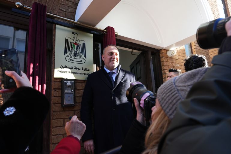Palestinian Ambassador to the UK Dr Husam Zomlot poses by a name plaque during the inauguration ceremony for the Embassy of the State of Palestine, formerly known as the Palestinian Mission, in Hammersmith, west London, after the mission was upgraded to embassy status last September following the UK's recognition of the Palestine state. Picture date: Monday January 5, 2026. (Photo by Aaron Chown/PA Images via Getty Images)