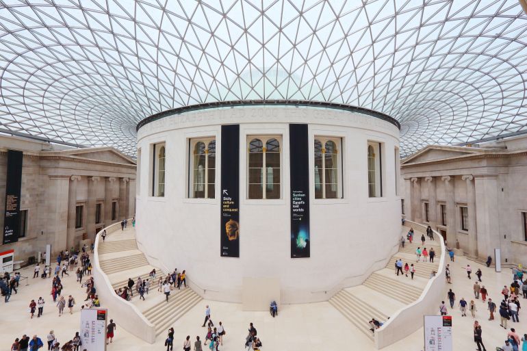 LONDON, UK - JULY 9, 2016: People visit British Museum Great Court in London. The museum was established in 1753 and holds approximately 8 million objects.