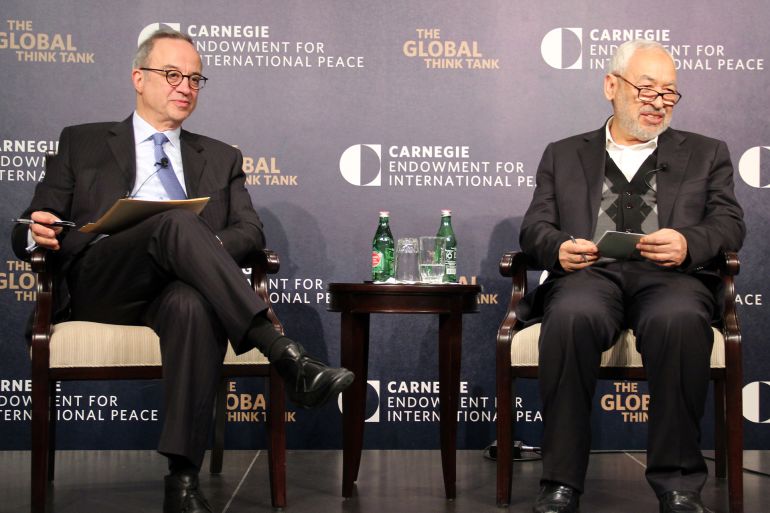 image-1778133048 WASHINGTON, DC - FEBRUARY 26: Rached Ghannouchi (R), the leader of Tunisia's ruling Ennahda party, speaks about the Tunisia's democratic transition at Carnegie Endowment for International Peace in Washington, DC, on February 26, 2014. (Photo by Erkan Avci/Anadolu Agency/Getty Images)