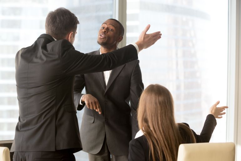 Ambitious african american male candidate insisting on getting a job, male and female caucasian recruiters asking quarrelsome applicant to leave office. Failed interview, conflict at work or dismissal