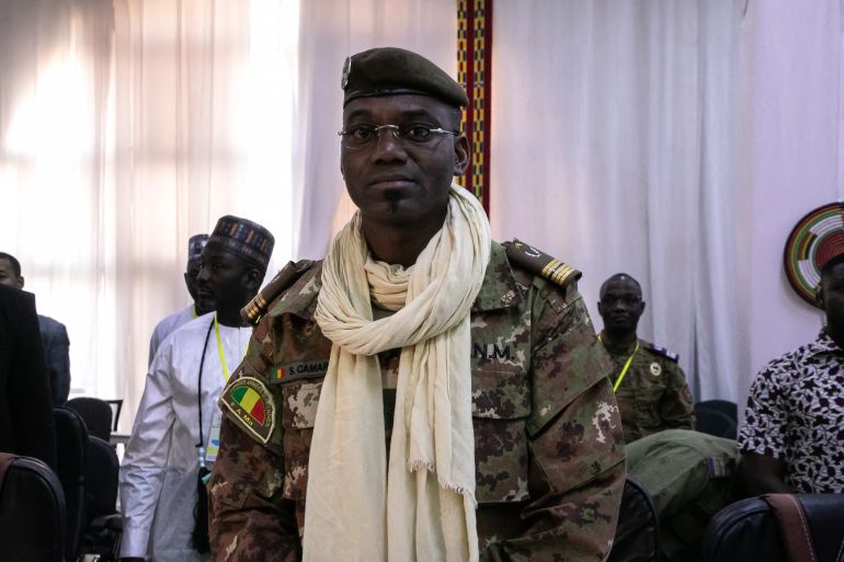(FILES) Colonel Sadio Camara, Minister of Defense and Veterans of Mali, is seen at the meeting of Ministers of the Alliance of Sahel States (AES), Ouagadougou, February 15, 2024. Mali's defence minister died after an attack on his house, his family said on April 26, 2026, as the army fought a second day of battles with jihadist fighters and separatist rebels near the capital Bamako and other cities, putting the Sahel nation's ruling junta under severe pressure. Defence Minister Sadio Camara, his second wife and two of his grandchildren died after a car bomb attack on his home in the junta stronghold of Kita, outside Bamako, his family and an official said. April 25's shock synchronised attacks by Tuareg rebels of the Azawad Liberation Front (FLA) coalition and the jihadist Group for the Support of Islam and Muslims (JNIM) targeted several areas in the vast arid country. (Photo by FANNY NOARO-KABRÉ / AFP)