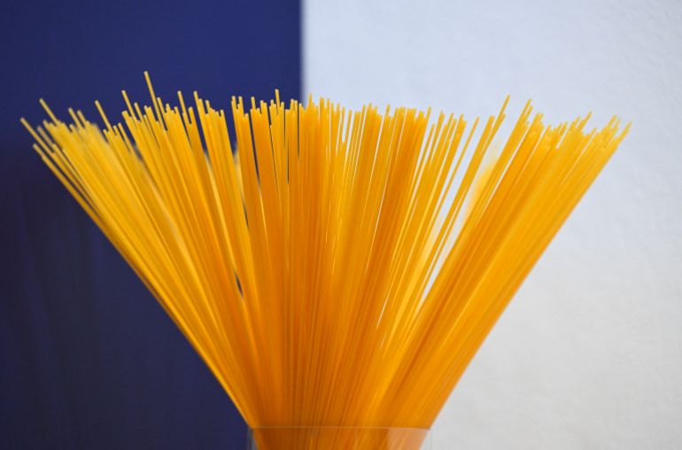 This photograph shows spaghetti pasta during the Barilla Innovation & Technology Experience (BITE) media day at the Barilla headquarters in Parma, on November 18, 2025. Barilla has invested 20 million in a research and development center (Barilla Innovation & Technology Experience - BITE) employing 200 people, which aims to solidify the group's position among the giants of "Made in Italy", marking the companys most significant investment in food innovation in recent years. (Photo by Stefano RELLANDINI / AFP)