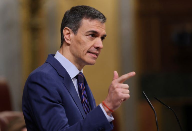 pedro-sanchez3-1774438498 Spain's Prime minister Pedro Sanchez gestures as he addresses parliament over the war in the Middle East at the congress in Madrid on March 25, 2026. Spanish Prime Minister Pedro Sanchez warned that the Middle East war presented a "far worse" scenario than the invasion of Iraq in 2003. (Photo by Thomas COEX / AFP)