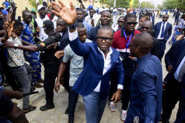 FILE PHOTO: Romuald Wadagni, Benin's finance minister and the ruling party candidate for the presidential election, waves after presenting his platform in Cotonou, Benin March 21, 2026. REUTERS/Charles Placide Tossou/File Photo