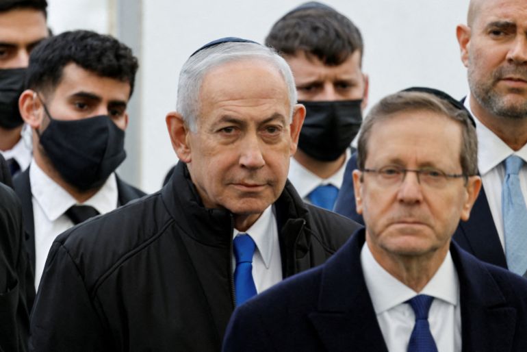 reuters_69f41c46-1777605702 FILE PHOTO: Israeli Prime Minister Benjamin Netanyahu and Israeli President Isaac Herzog attend a memorial service held for Ran Gvili, an off-duty police officer who was killed fighting militants that had infiltrated Israel during the deadly October 7, 2023, attack by Hamas, and the last hostage recovered from Gaza, in Meitar, Israel, January 28, 2026. REUTERS/Amir Cohen/File Photo