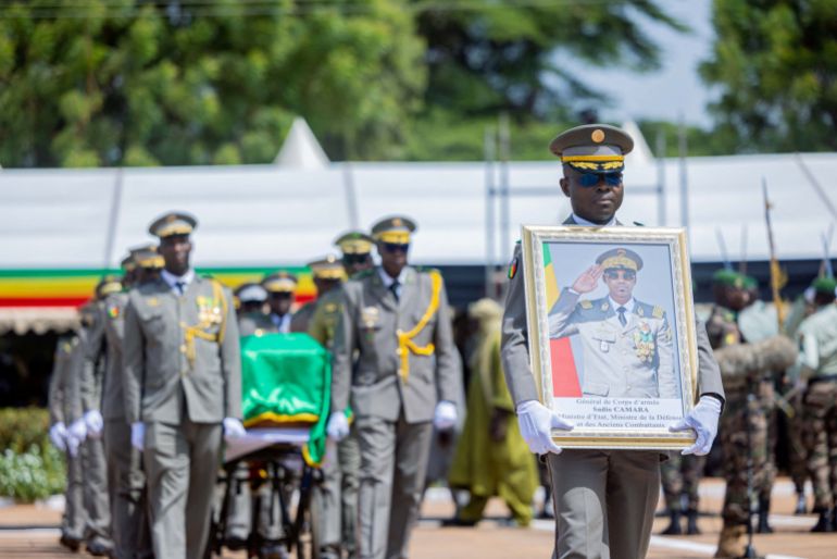 A framed portrait and the coffin of Malian Defence Minister Sadio Camara, who was killed in a militant attack, are displayed on the day of his state funeral, in Bamako, Mali, April 30, 2026. Mali Presidency via Facebook /Handout via REUTERS THIS IMAGE HAS BEEN SUPPLIED BY A THIRD PARTY. NO RESALES. NO ARCHIVES. MANDATORY CREDIT. VERIFICTION: Reuters was not able to verify the location where the pictures were taken, however, Mali Presidency said in a statement that the ceremony took place on the parade ground of the 34th Military Engineering Regiment in Bamako. The date was confirmed by corroborating media and government reports. No old reports were found posted online before April 30.