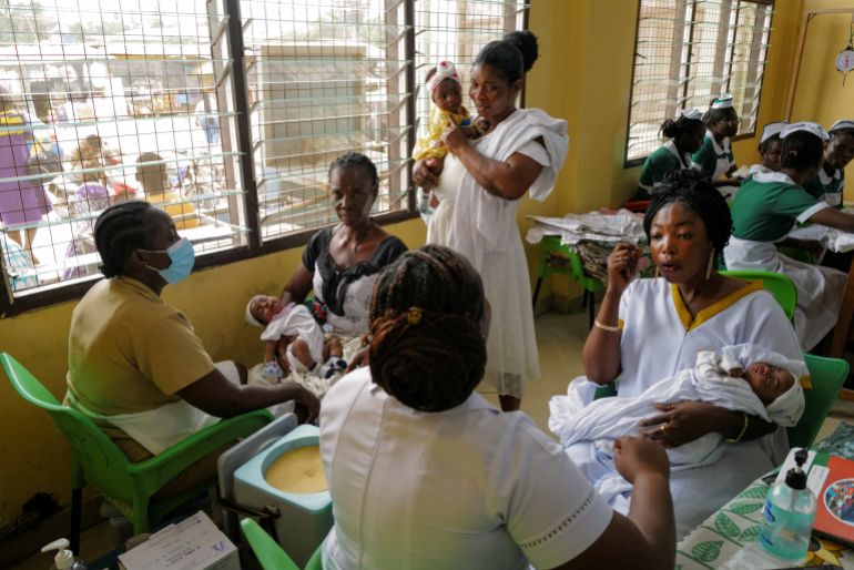 FILE PHOTO: Mothers wait to have their infants vaccinated at the Mother and Child Hospital in Kasoa, Ghana, November 19, 2025. REUTERS/Francis Kokoroko/File Photo