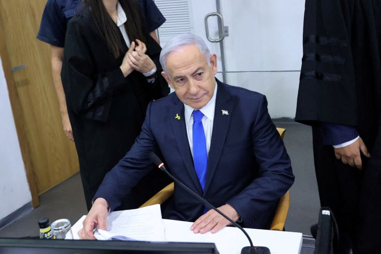 FILE PHOTO: Israeli Prime Minister Benjamin Netanyahu attends his trial on corruption charges at the district court in Tel Aviv, Israel, 21 April, 2025. Moti Kimchi/Pool via REUTERS/File Photo