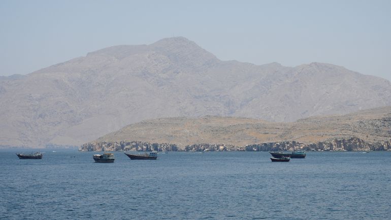 reuters_69fb34ea-1778070762 Vessels in the Strait of Hormuz, Musandam, Oman, May 6, 2026. REUTERS/Stringer