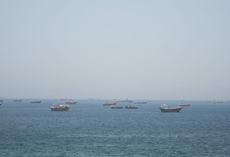 reuters_69fdfd5d-1778253149-1 Vessels in the Strait of Hormuz, Musandam, Oman, May 8, 2026. REUTERS/Stringer