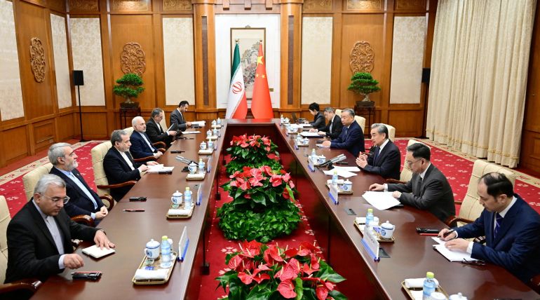 Chinese Foreign Minister Wang Yi and Iranian Foreign Minister Abbas Araqchi attend a bilateral meeting in Beijing, China, in this handout image released by China's Ministry of Foreign Affairs May 6, 2026. China's Ministry of Foreign Affairs/Handout via REUTERS ATTENTION EDITORS - THIS IMAGE WAS PROVIDED BY A THIRD PARTY. NO RESALES. NO ARCHIVES.