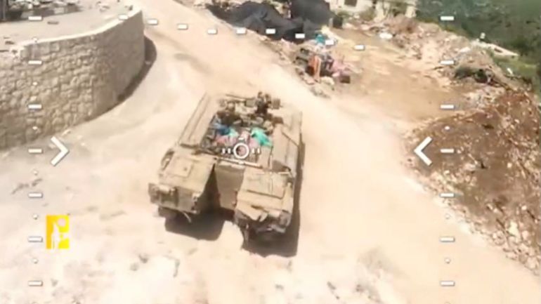 reuters_6a02313b-1778528571 Footage released by Hezbollah claims to show an attack on an armored personnel carrier, carried out in Qantara, Lebanon, in this screengrab taken from a handout video released on April 28, 2026. Hezbollah Military Media/Handout via REUTERS THIS IMAGE HAS BEEN SUPPLIED BY A THIRD PARTY. OVERLAY FROM SOURCE. Verification lines : Reuters verified the location as Qantara, Lebanon, by the field, the building and the road layout seen in the video, which matched satellite imagery of the area. The date when the video was recorded could not be verified. Hezbollah said on April 28 it targeted an armored personnel carrier in the town of Qantara, with a drone, on April 24. The IDF said in a statement on April 24 that Hezbollah launched explosive drones toward IDF soldiers operating in the Qantara area and that no IDF injuries were reported.