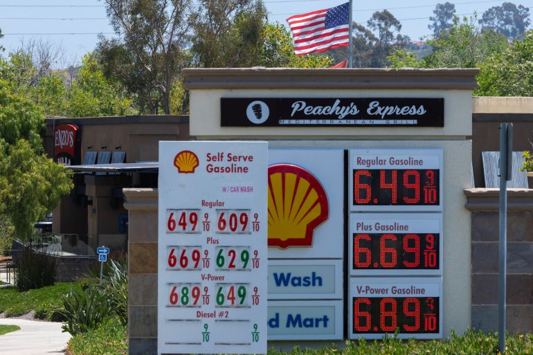The current price of gasoline is shown at a gas station in Encinitas, California, U.S., May 11, 2026. REUTERS/Mike Blake