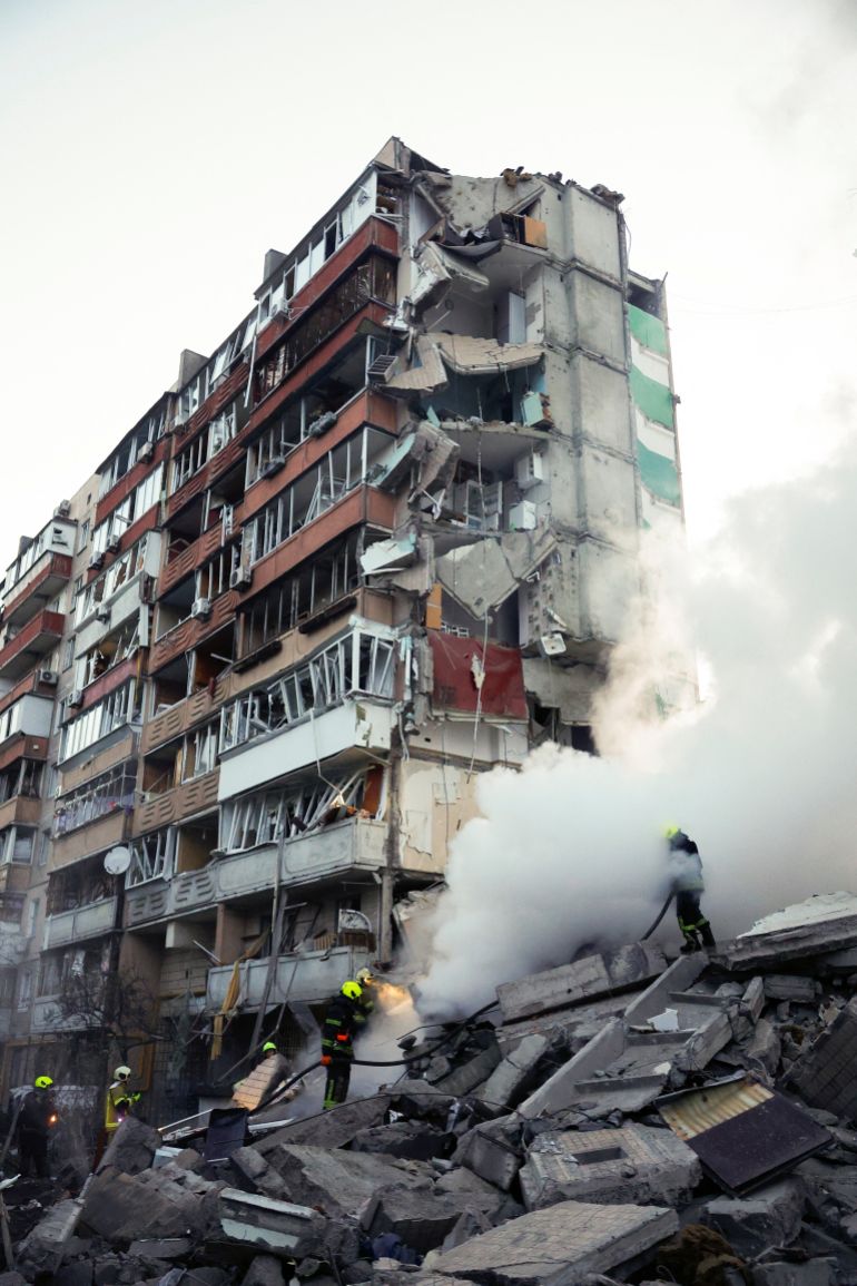 Rescuers search for people under the debris at the site of an apartment building damaged during Russian missile and drone strikes, amid Russia's attack on Ukraine, in Kyiv, Ukraine May 14, 2026. REUTERS/Valentyn Ogirenko